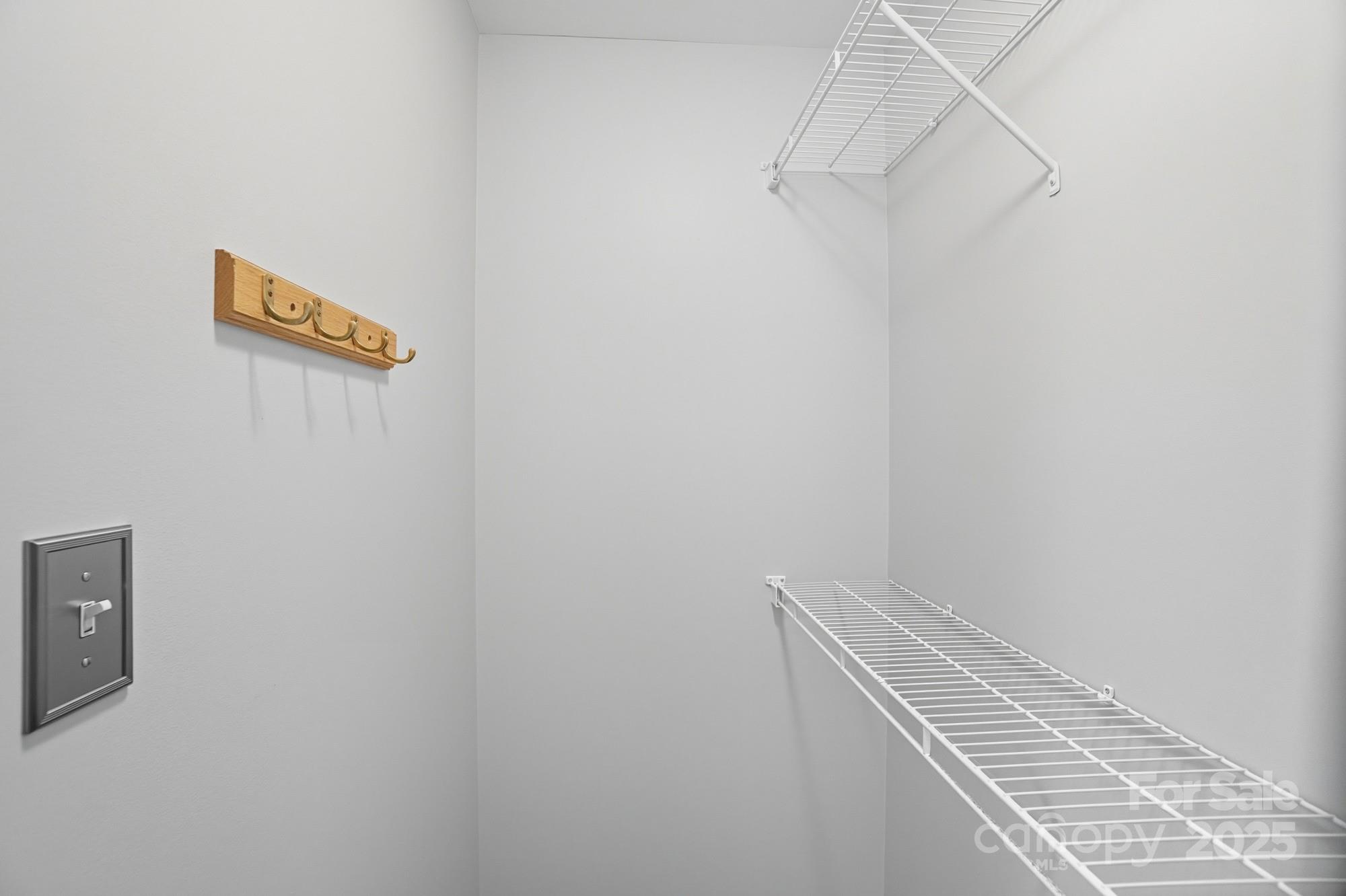 3633 Creek Ridge Drive Denver, NC 28037 - Photo 30 of 47 a view of a room with racks on the wall