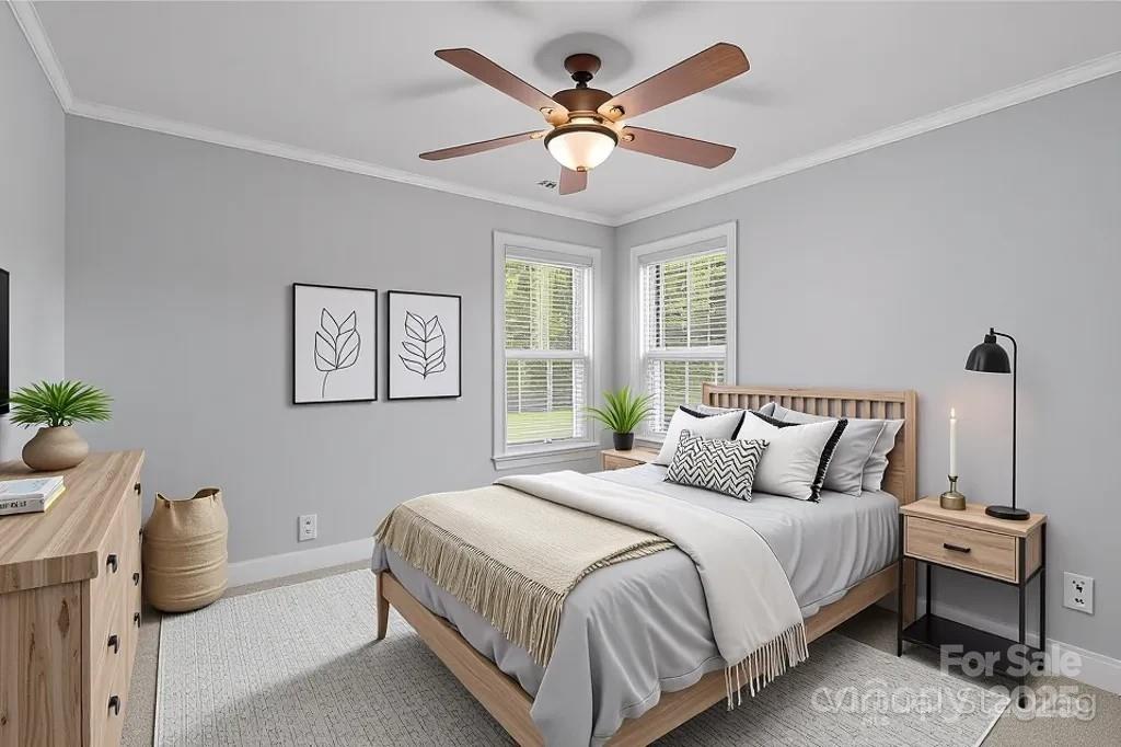 3633 Creek Ridge Drive Denver, NC 28037 - Photo 36 of 47 a bedroom with a bed and a chandelier