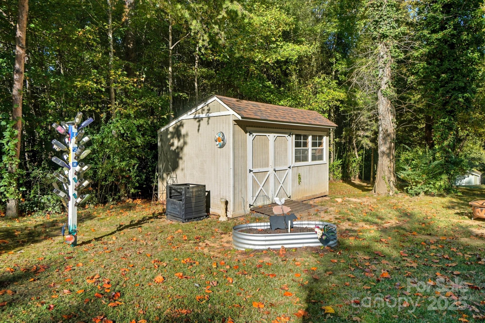 3633 Creek Ridge Drive Denver, NC 28037 - Photo 46 of 47 a view of a house with backyard and sitting area