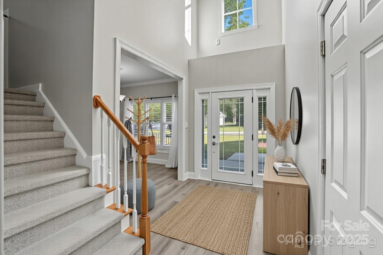 3633 Creek Ridge Drive Denver, NC 28037 - Photo 5 of 47 a view of a hallway with wooden floor and entryway