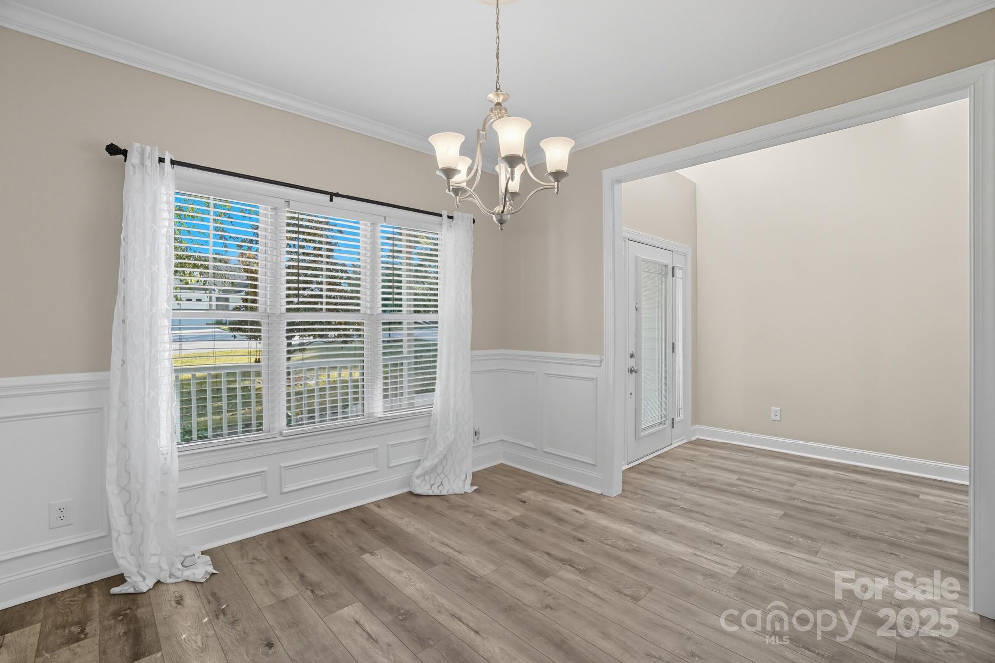 3633 Creek Ridge Drive Denver, NC 28037 - Photo 8 of 47 a view of an empty room with a window