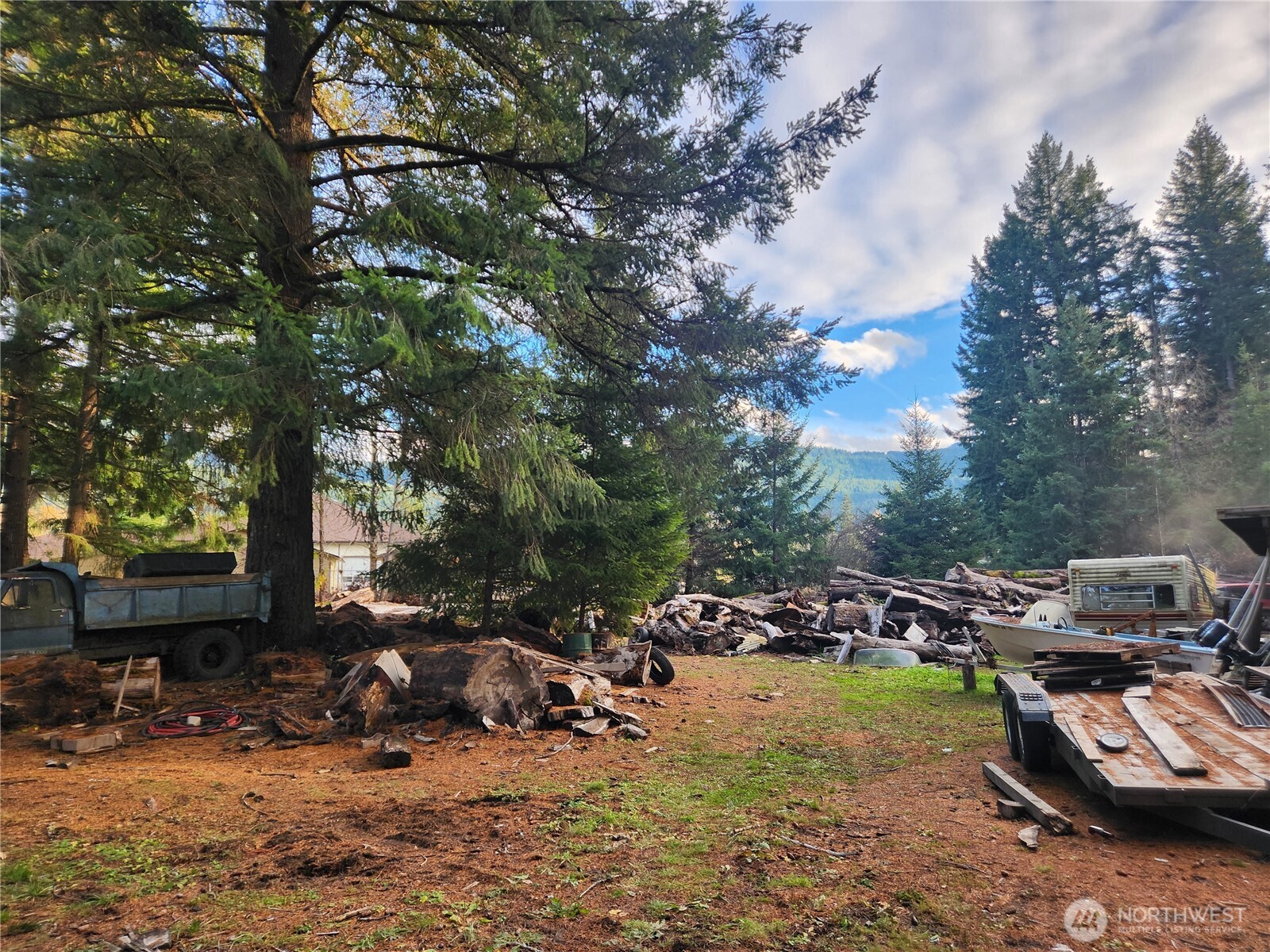 125 Edmonds Road Packwood, WA 98361 - Photo 4 of 6 a view of a lake with parked cars