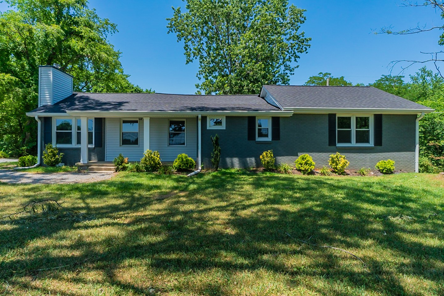 310 Tom Link Road Cottontown, TN 37048 - Photo 1 of 44 a front view of house with yard and green space
