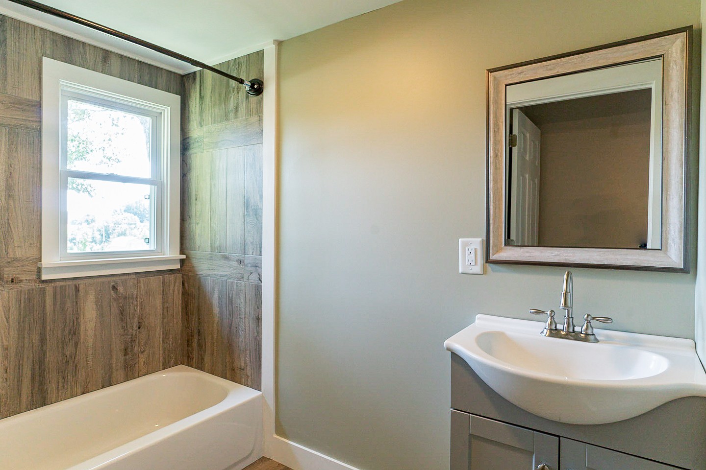 310 Tom Link Road Cottontown, TN 37048 - Photo 25 of 44 a bathroom with a sink and a mirror