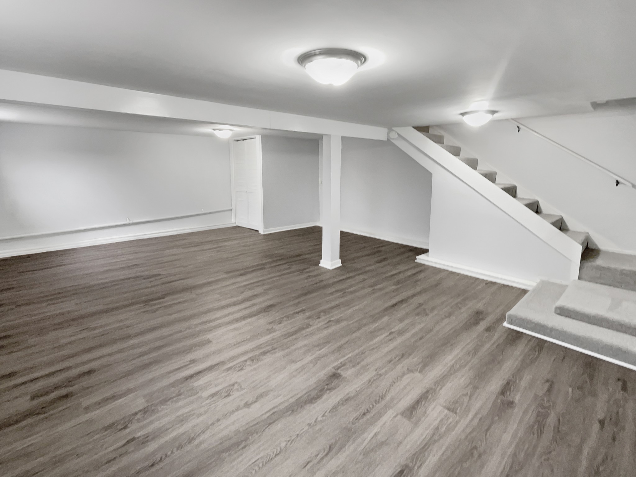 310 Tom Link Road Cottontown, TN 37048 - Photo 28 of 44 a view of an empty room with wooden floor