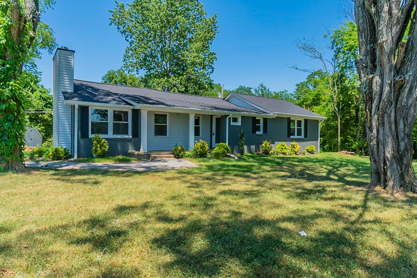 310 Tom Link Road Cottontown, TN 37048 - Photo 38 of 44 front view of a house with a yard