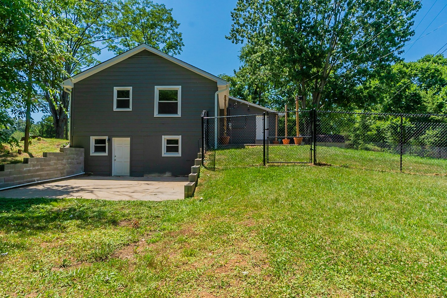 310 Tom Link Road Cottontown, TN 37048 - Photo 39 of 44 a view of a yard in front of a house with large tree
