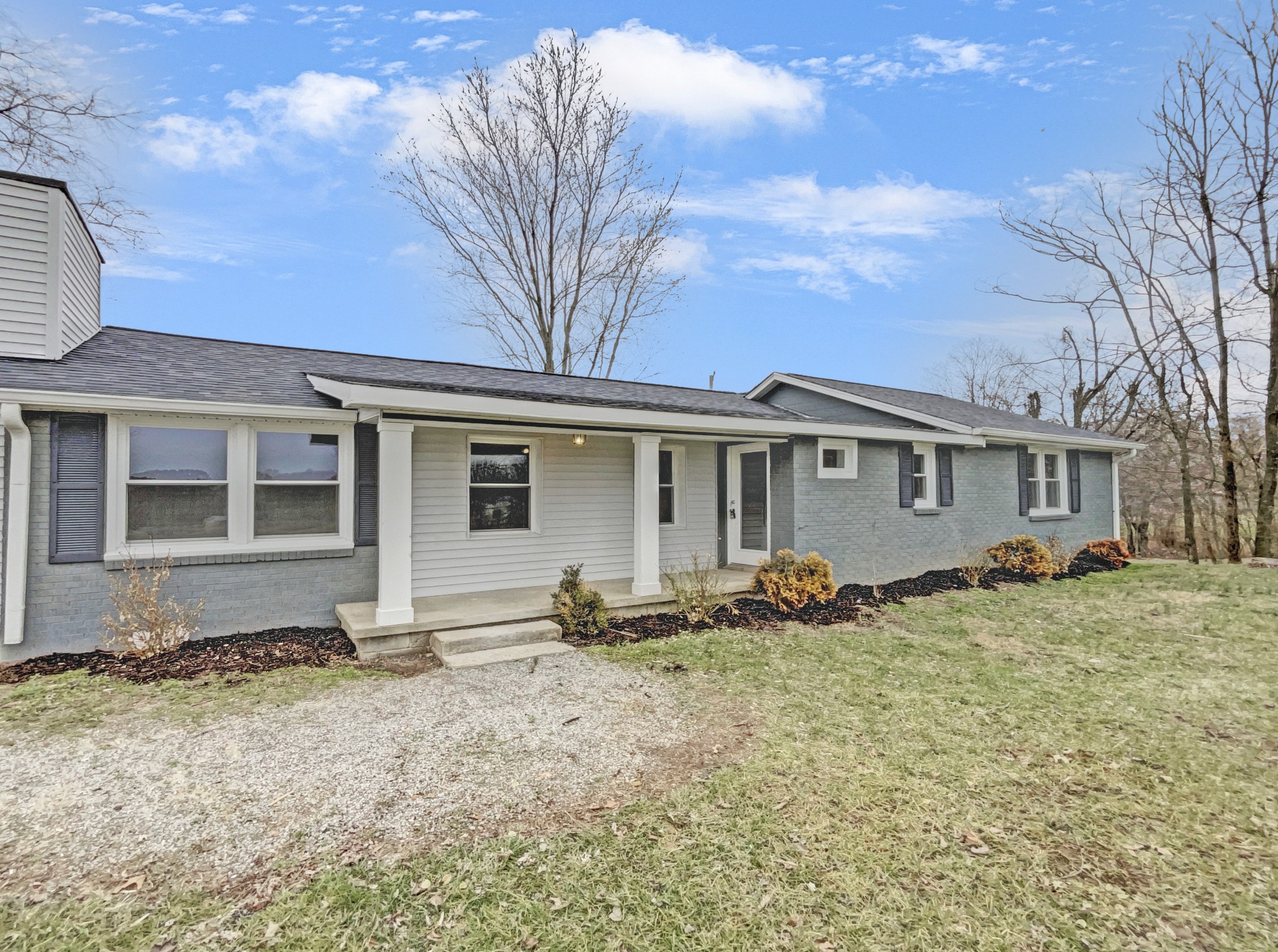 310 Tom Link Road Cottontown, TN 37048 - Photo 40 of 44 front view of a house with a yard