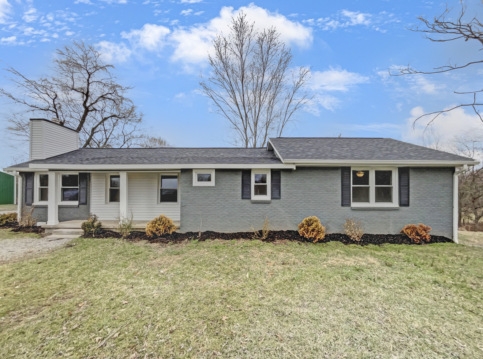310 Tom Link Road Cottontown, TN 37048 - Photo 42 of 44 a front view of a house with patio