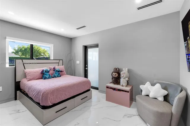 a bedroom with a bed and a closet