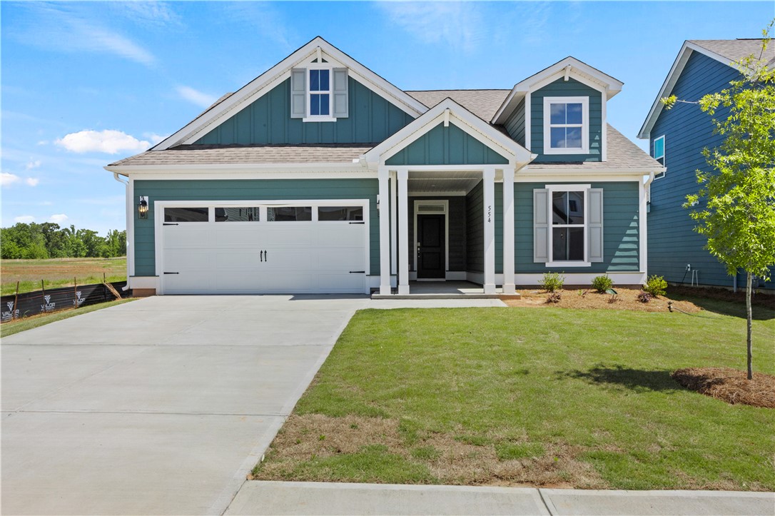 554 Hydrangea Street, Unit LOT 67 Seneca, SC 29678 - Photo 1 of 26 A striking teal exterior with white trim offers a modern farmhouse aesthetic and inviting curb appeal.