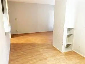 a view of walk in closet with window