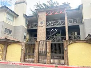 a view of staircase with lots of green walls