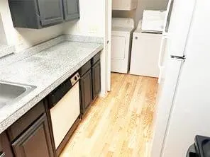 a view of a kitchen from a window