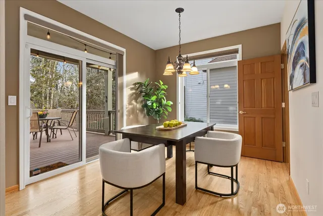 a view of a dining room with furniture window and outside view