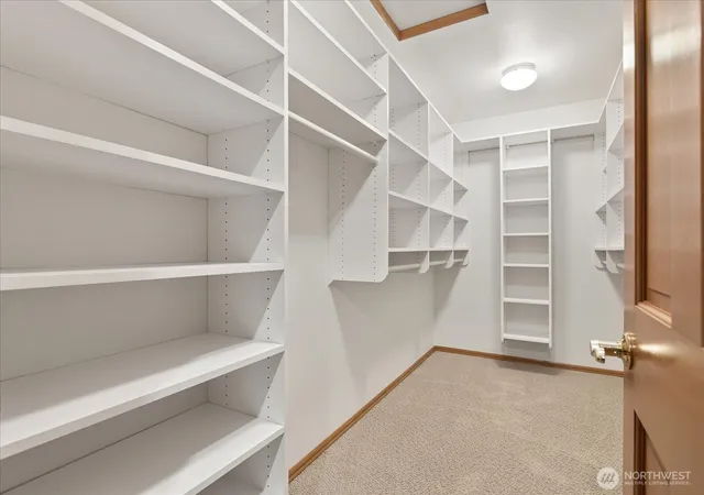 a view of an empty walk in closet