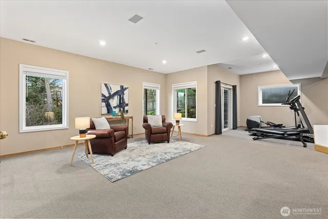 a living room with furniture window and a table