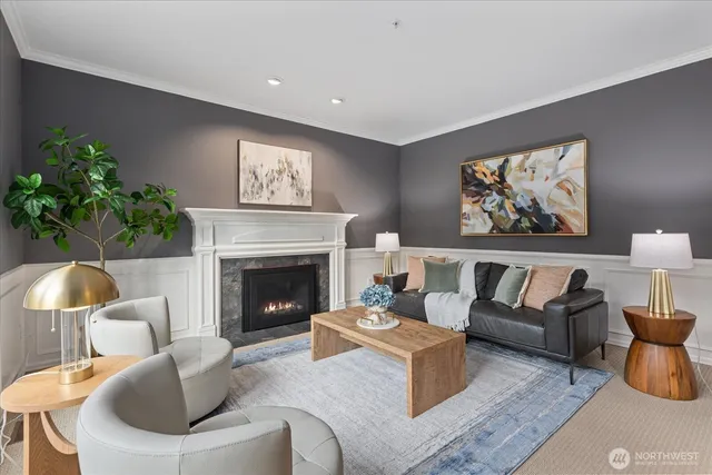 a living room with furniture and a fireplace