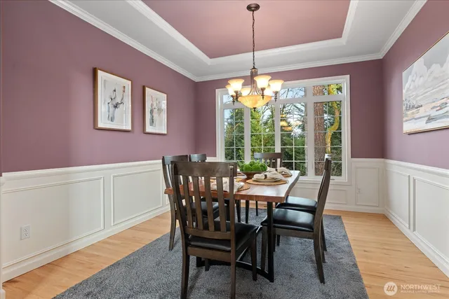 a view of a dining room with furniture window and outside view