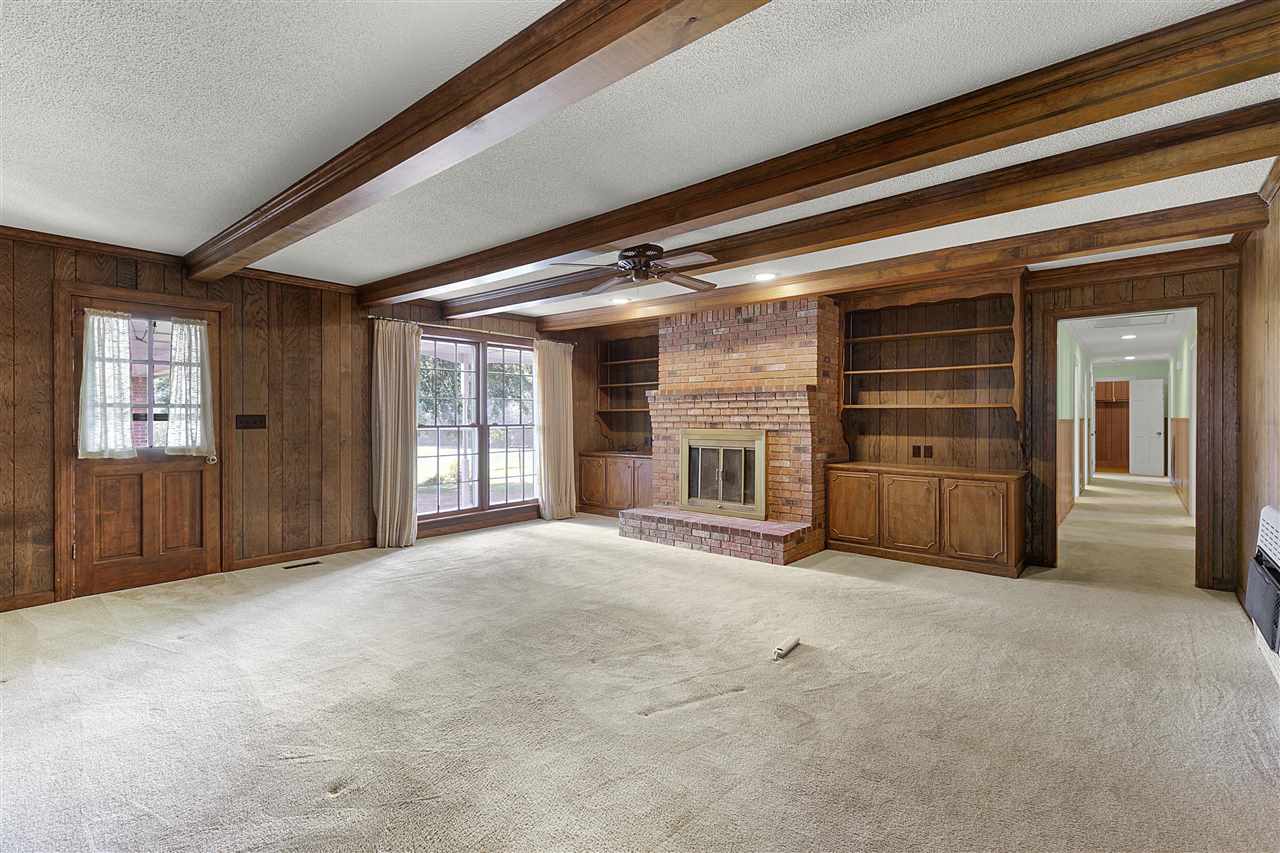 65 Reed Road Dyer, TN 38330 - Photo 16 of 25 With beamed ceiling, built-ins and double windows for natural light.