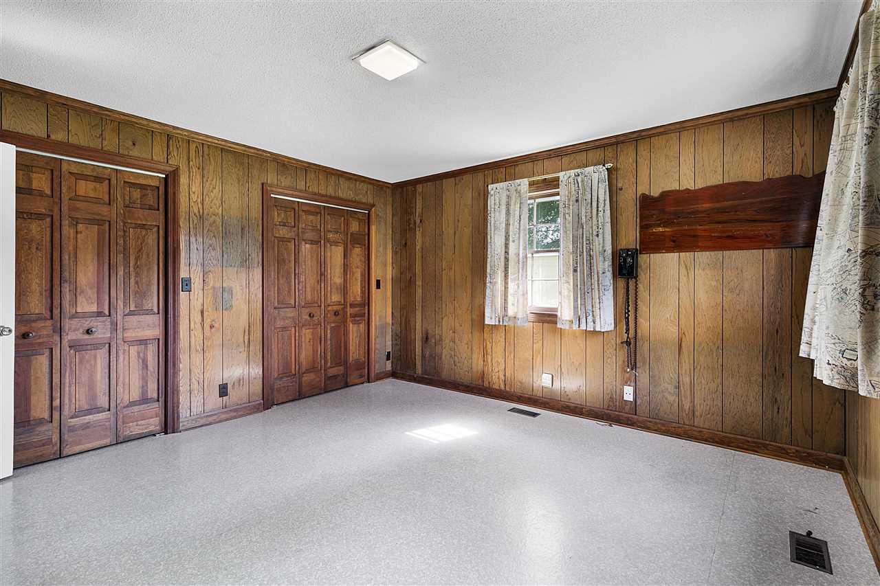 65 Reed Road Dyer, TN 38330 - Photo 23 of 25 This bedroom is on the back of the house and has double closets and 2 windows.