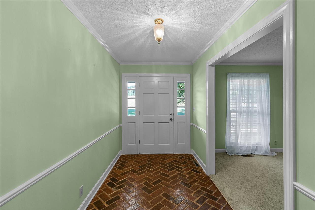 65 Reed Road Dyer, TN 38330 - Photo 8 of 25 Entry hall with brick floor