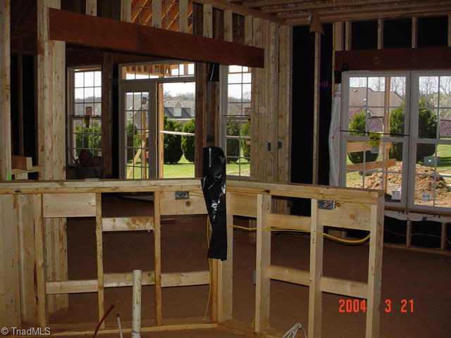 6011 Beckenham Way Oak Ridge, NC 27310 - Photo 7 of 8 Other. kitchen view to family room/porch