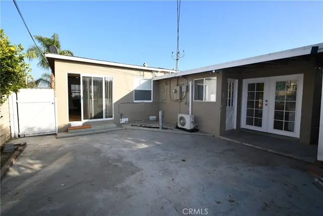 a view of a house with a street