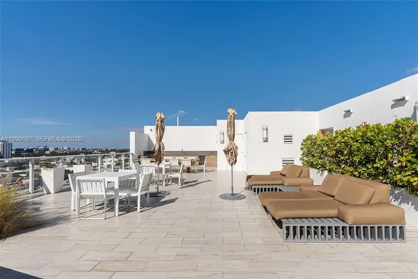 a view of a terrace with chairs