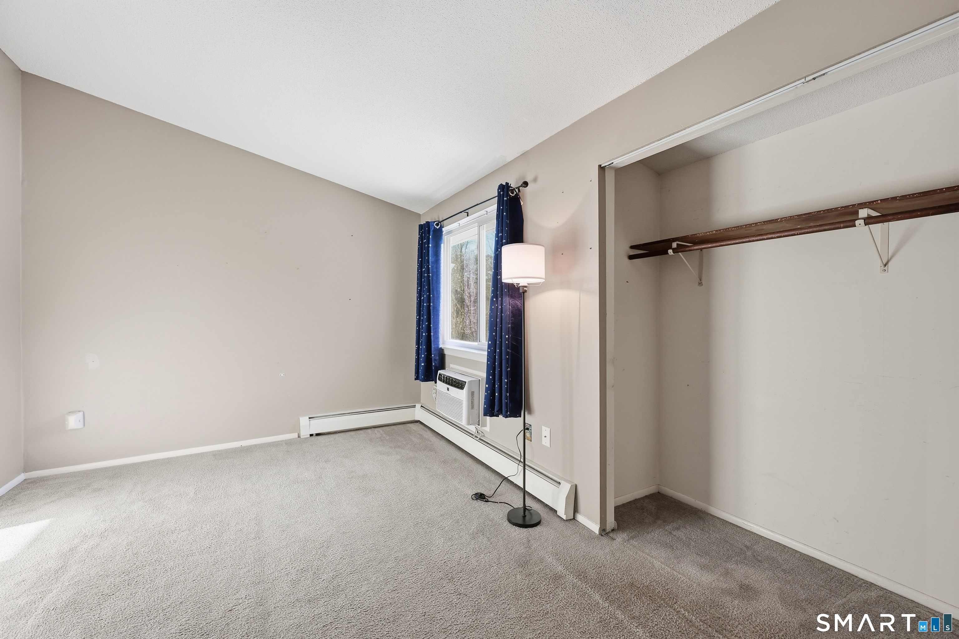 220 Main Street, Unit 2J New Hartford, CT 06057 - Photo 22 of 29 a view of an empty room