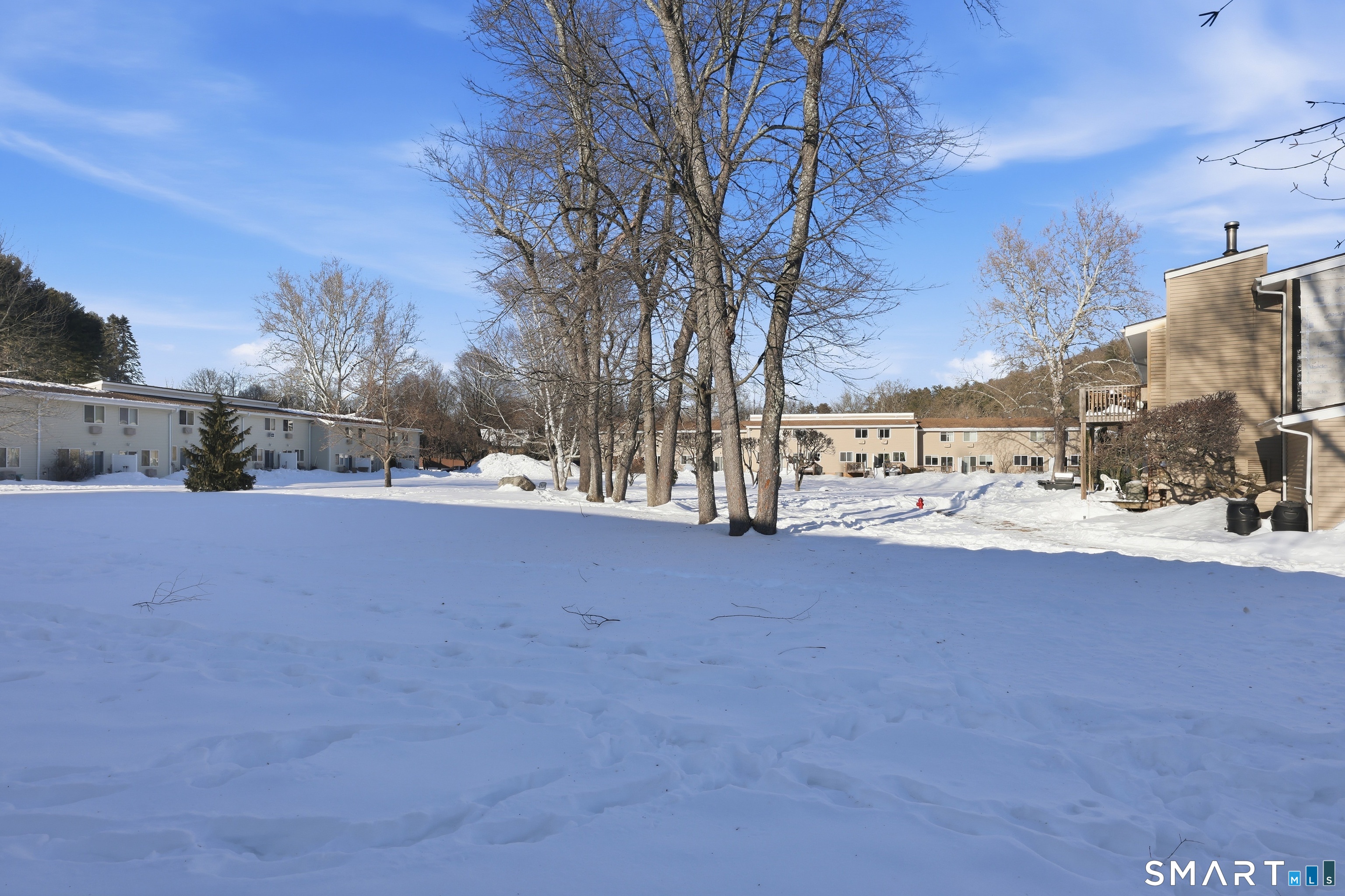 220 Main Street, Unit 2J New Hartford, CT 06057 - Photo 29 of 29 a view of road with large trees