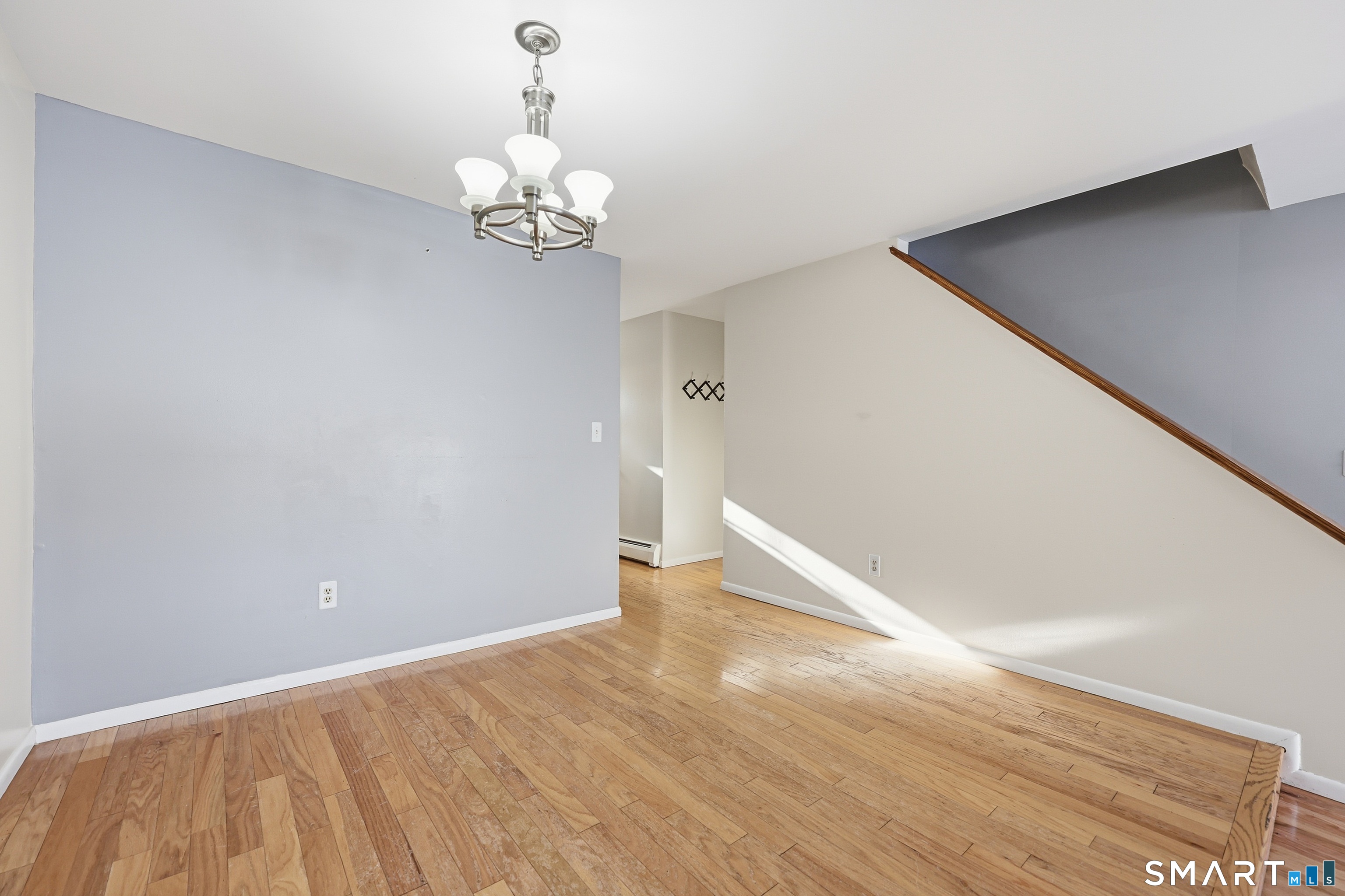 220 Main Street, Unit 2J New Hartford, CT 06057 - Photo 7 of 29 a view of an empty room with a window