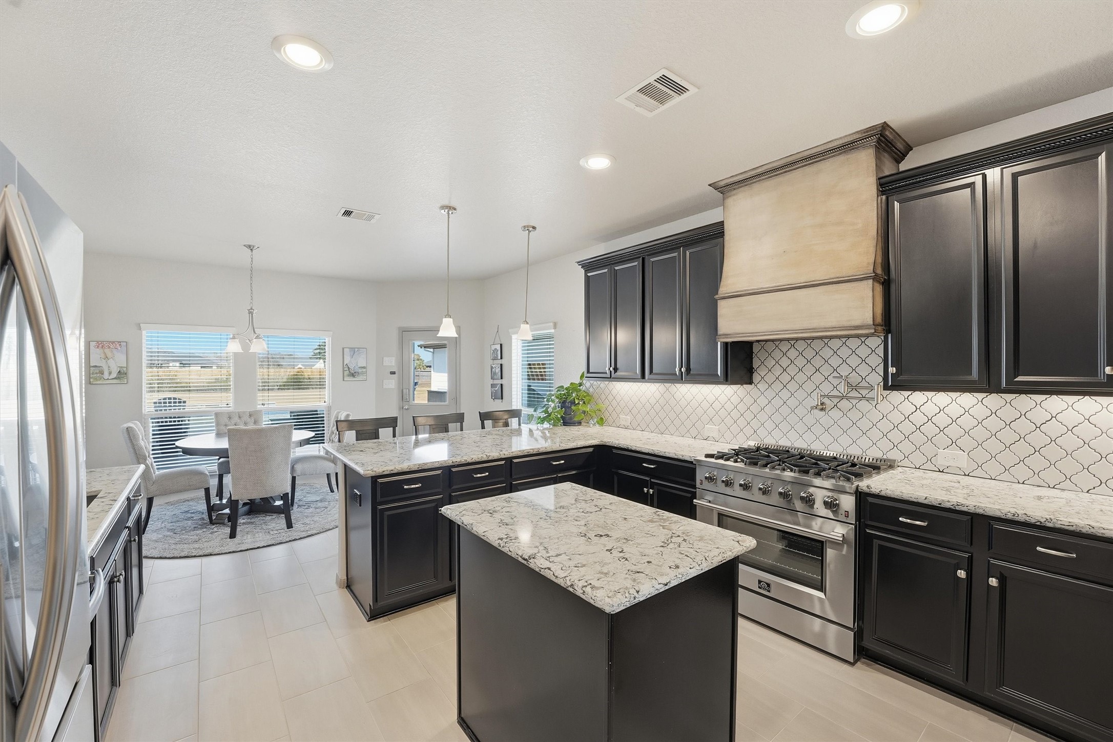 4735 Camp Creek Road Baytown, TX 77523 - Photo 2 of 41 a kitchen with granite countertop lots of counter top space
