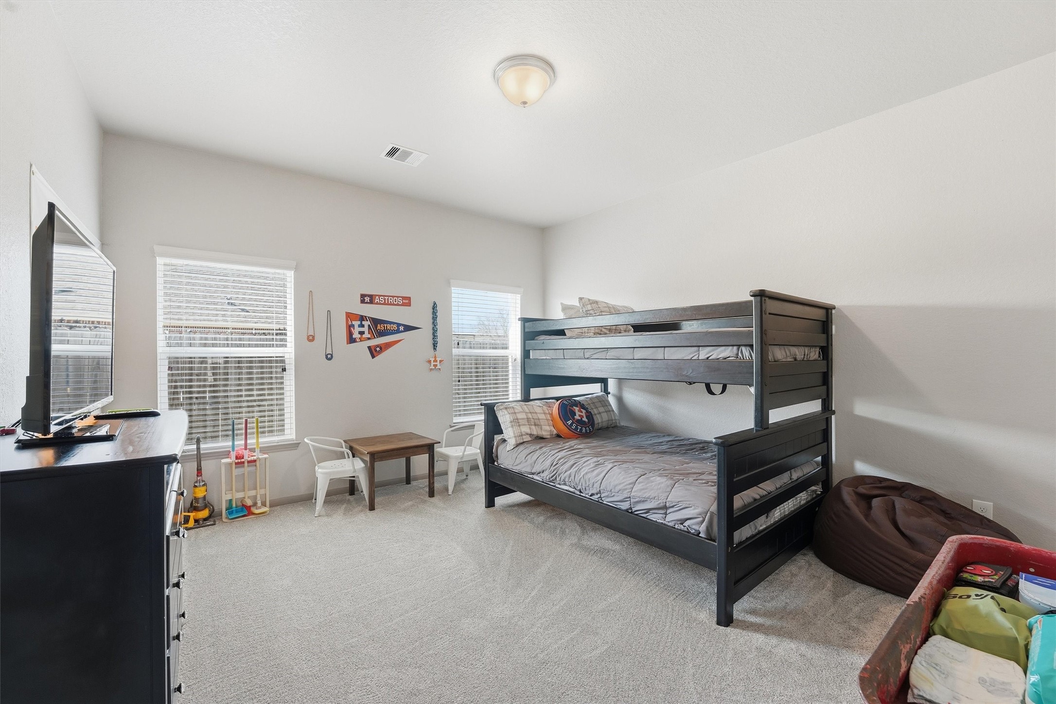 4735 Camp Creek Road Baytown, TX 77523 - Photo 25 of 41 a bedroom with furniture and windows