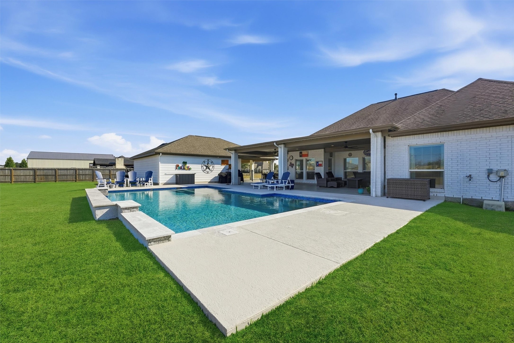 4735 Camp Creek Road Baytown, TX 77523 - Photo 30 of 41 a view of house with swimming pool and yard