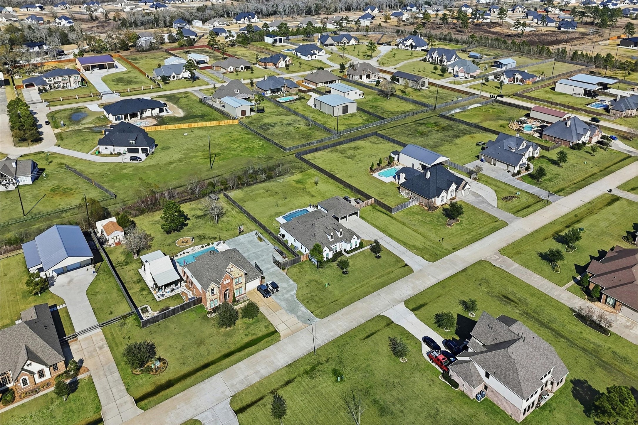 4735 Camp Creek Road Baytown, TX 77523 - Photo 36 of 41 an aerial view of residential houses with outdoor space