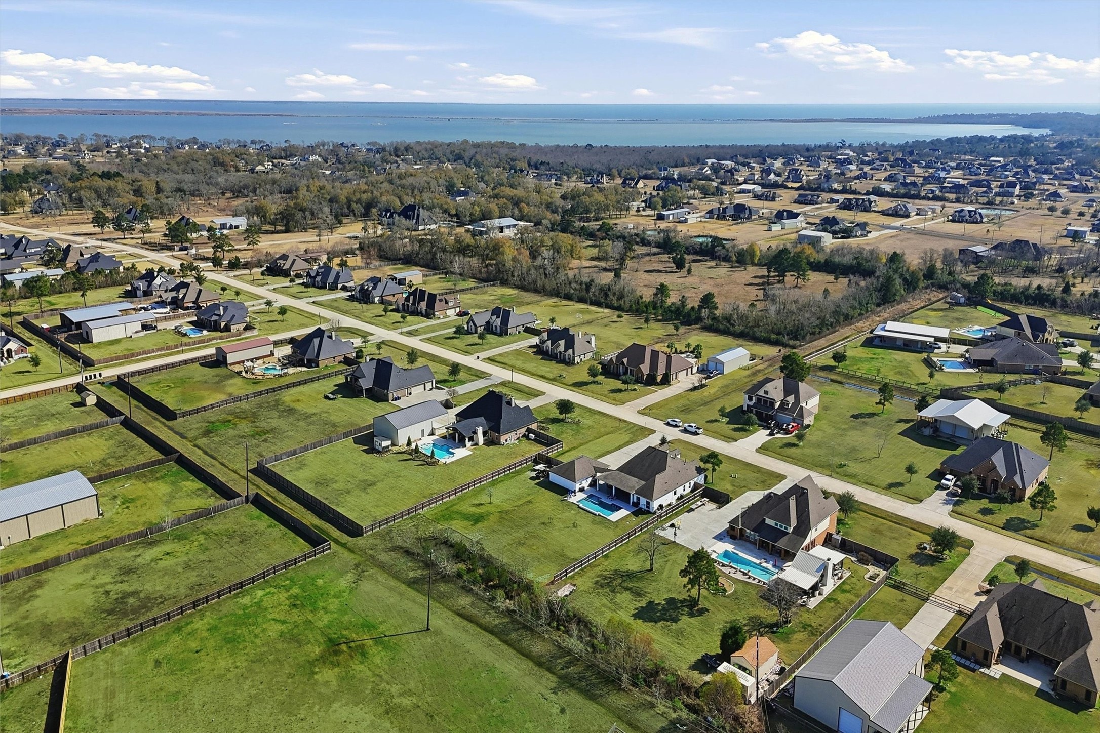 4735 Camp Creek Road Baytown, TX 77523 - Photo 38 of 41 an aerial view of residential houses with outdoor space