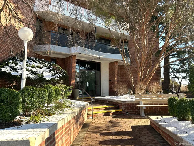a view of a house with fountain bath tub and chairs