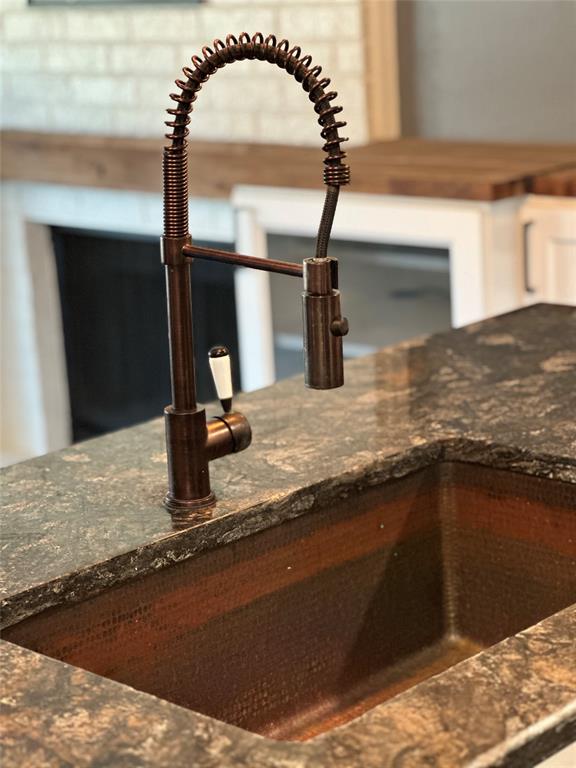 232 Samuel Boulevard, Unit 2 Coppell, TX 75019 - Photo 7 of 19 a close view of sink and tap