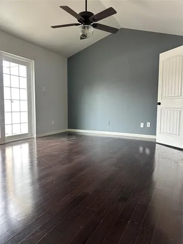 a bathroom with a shower and a toilet