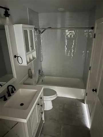 a swimming pool with trees in the background