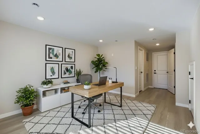 a workspace with furniture and window