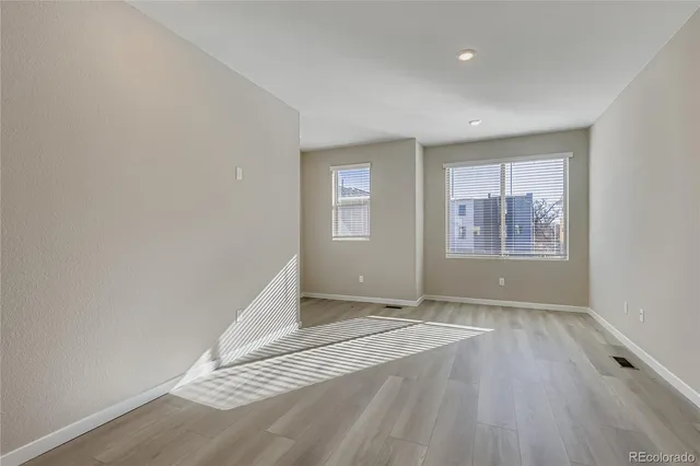 an empty room with windows