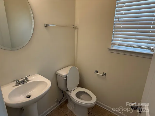 a bathroom with a sink and toilet