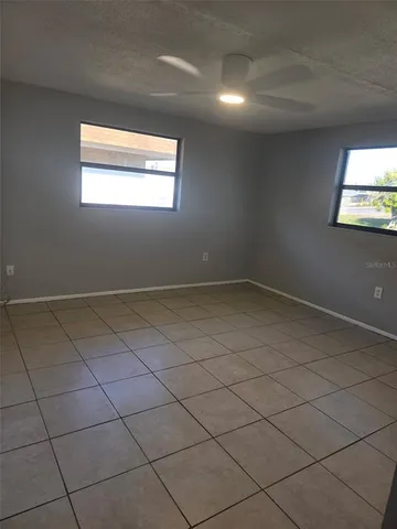 an empty room with windows