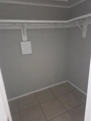 a view of a room with racks on the wall