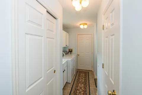 a bathroom with a sink and shower