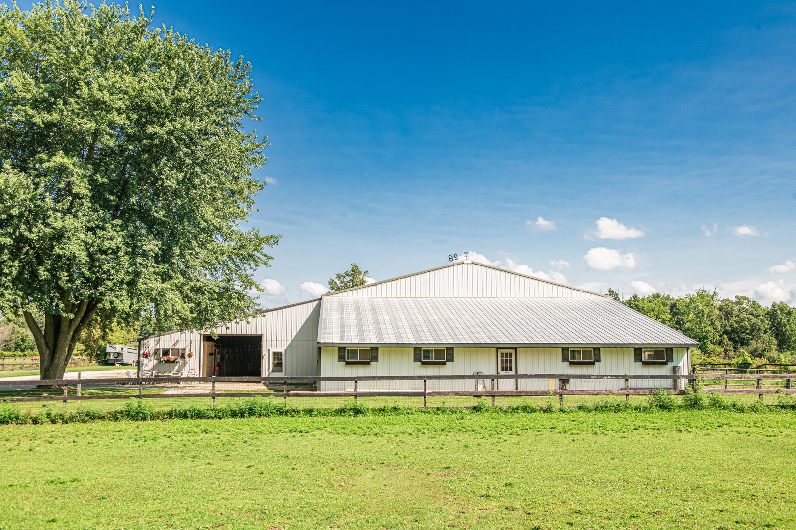 27490 West Wilmot Road Antioch, IL 60002 - Photo 39 of 50 a house with swimming pool in front of it