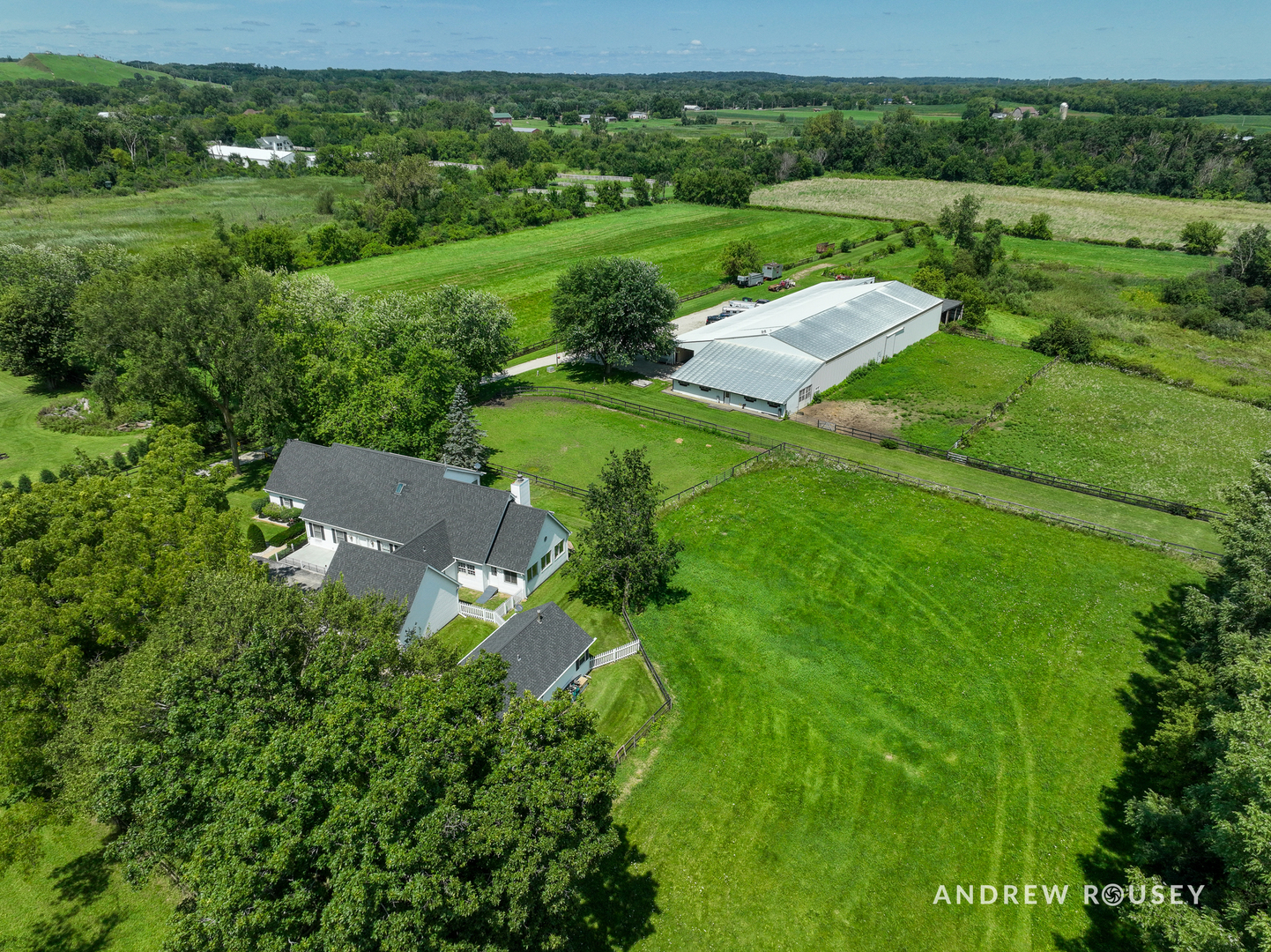 27490 West Wilmot Road Antioch, IL 60002 - Photo 8 of 50 a view of a garden with a building in the background