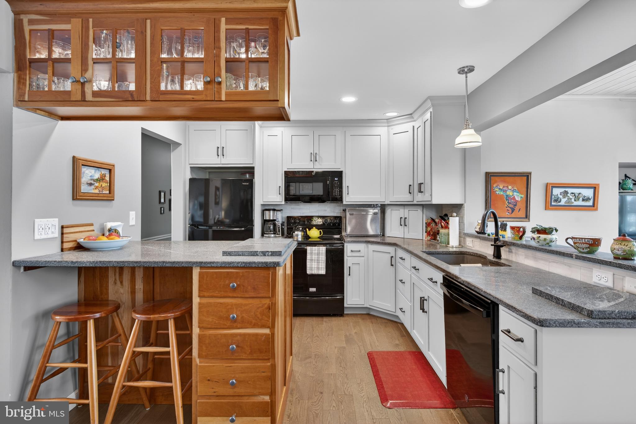 146 South Oak Street Lititz, PA 17543 - Photo 11 of 55 a large kitchen with stainless steel appliances granite countertop a stove and a sink